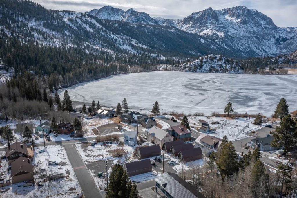 Aerial view of June Lake village and the surrounding Eastern Sierra mountains near The Acorns Village